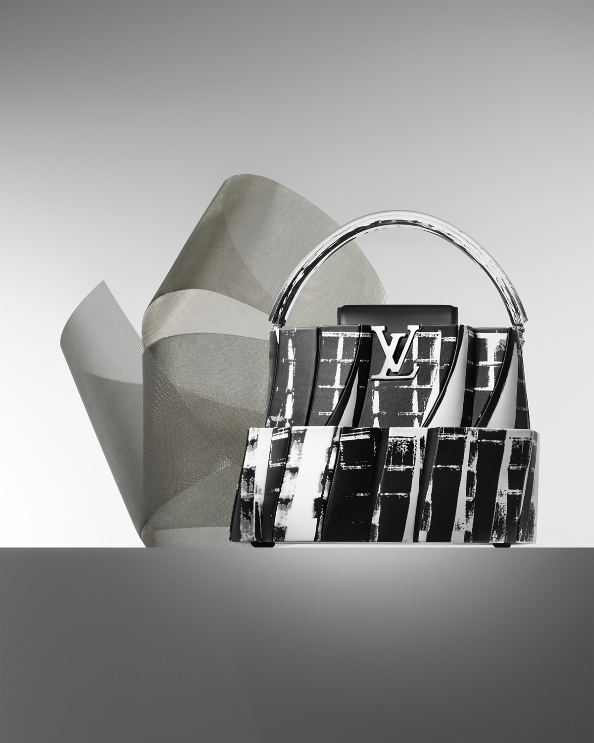 Louis Vuitton与名建筑师Frank Gehry合作推出了一系列手袋